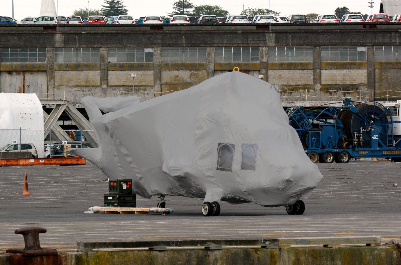 AUCKLAND - OCT 13 2015:New helicopter covered in protective plastic wrap.Recently helicopter industry expending as oil companies demand for helicopters to transport staff and equipment is growing.